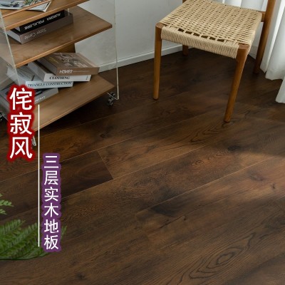 侘寂风新三层实木地板家用设计师环保耐磨防潮E0人字拼木地板厂家图4